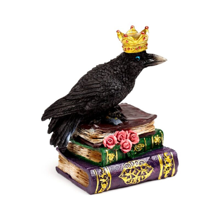 Krähe mit Krone in Büchern steht