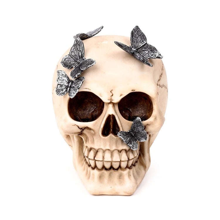 Totenkopf mit metallischen Schmetterlingen