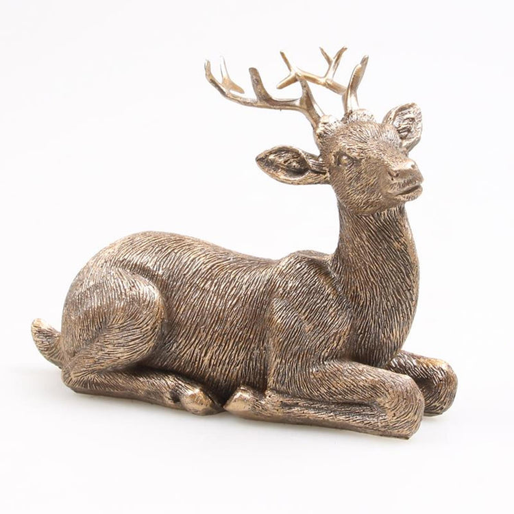 Von der Jahreszeit inspirierte Dekorationsstatue eines liegenden Hirsches in Gold, 15 x 10 x 15 cm