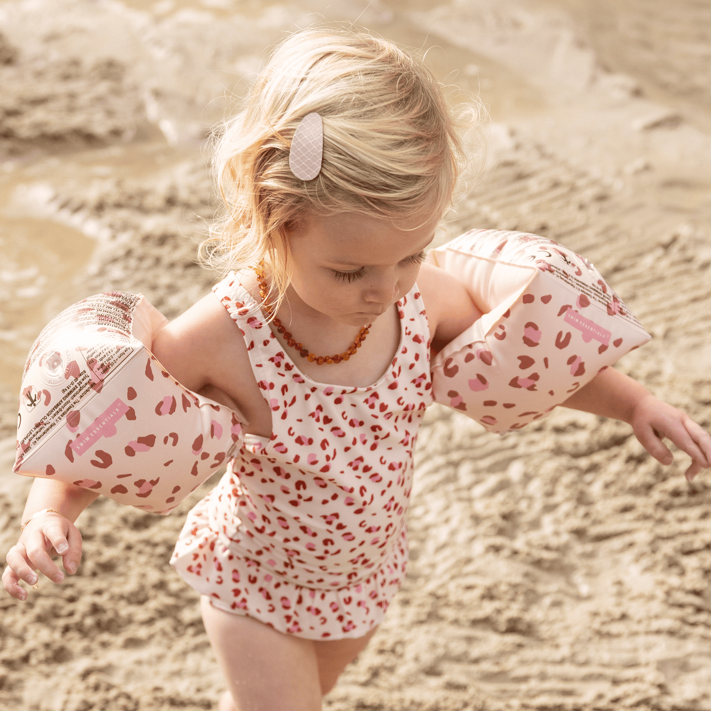 Leopard | Alte rosa Armbinden 0-2 Jahre alt
