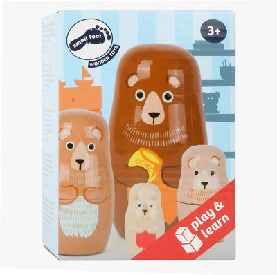 Kleine Fußholzmatryoshka -Puppen tragen Familie