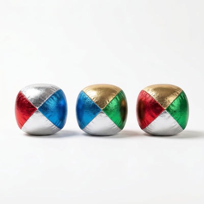 Engelhart Jonglierbälle metallic 2,5 – vierfarbig (blau, rot, gelb, grün) – Set in transparenter Röhre – Jonglier-Zauberspiel –