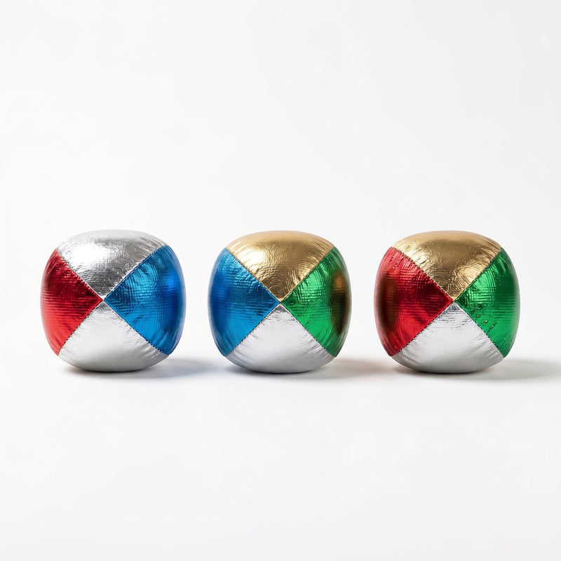 Engelhart Jonglierbälle metallic 2,5 – vierfarbig (blau, rot, gelb, grün) – Set in transparenter Röhre – Jonglier-Zauberspiel –