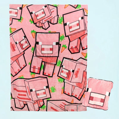 Paladone Minecraft Pig 2-in-1-Kissendecke – offiziell lizenzierte Microsoft-Reisedecke, faltbares, weiches, flauschiges Plaid, kompaktes Design für Wohn- oder Schlafzimmerdekoration, 120 cm x 150 cm –