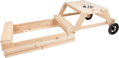 Kleine Fuß -Sandkiste mit Sitzbereich und mäßiger Tisch