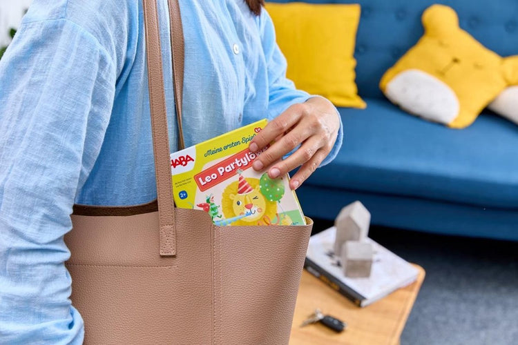 Haba Lernspiel Leo der Partylöwe – bunter Kinderspielkarton.