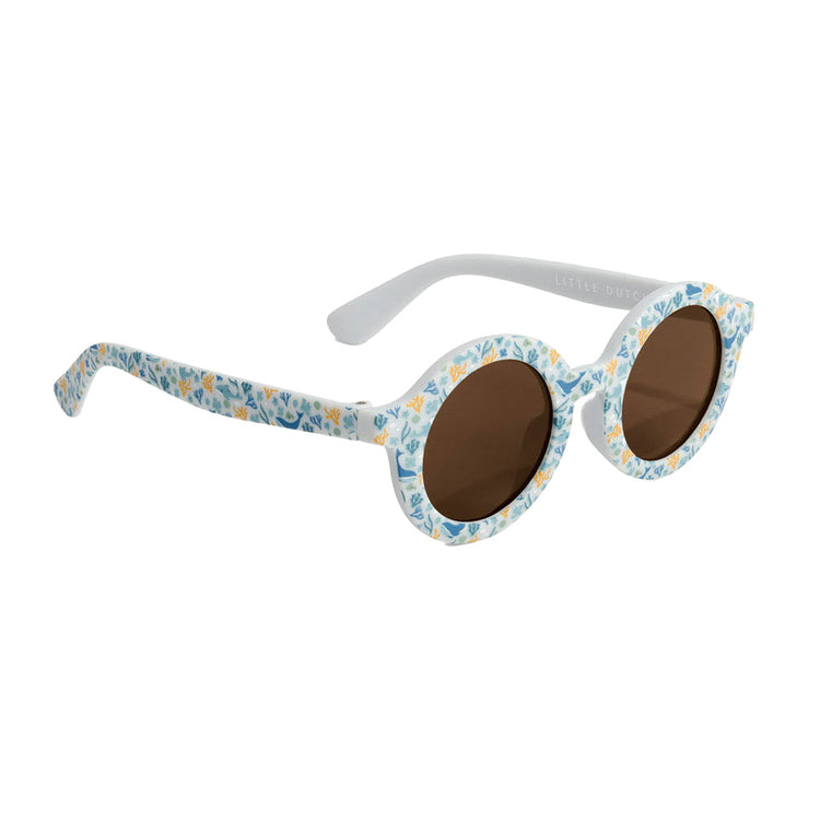 Kleine niederländische Kinder Sonnenbrille Ozean Träume blau