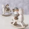 Boltze Home Weihnachtsmann auf Schaukelpferd aus Kunstharz, H11 cm