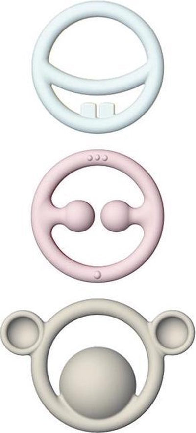 Moluk Nigi, Nagi Nogi-Set in Pastellfarben, Set mit 3 taktilen Beißringen in verschiedenen Farben, aus Silikonkautschuk, in Box 12,5 x 2 x 25,8 cm, 0+