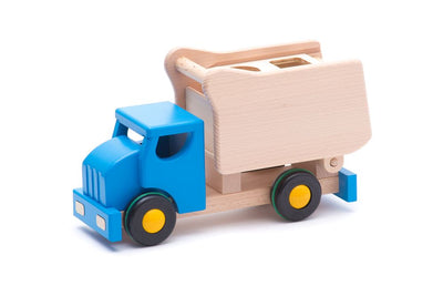 Bajo-Muldenkipper aus Holz mit blauen Blöcken.