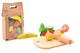 Jouéco schneidet Obst. 3+
