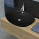 Vidaxl -Waschbecken mit Landung schwarzer ovaler Keramik 59 x 38,5 cm