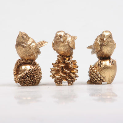 Saisonale Deko Vogel auf Nuss Gold 5x3x6 cm