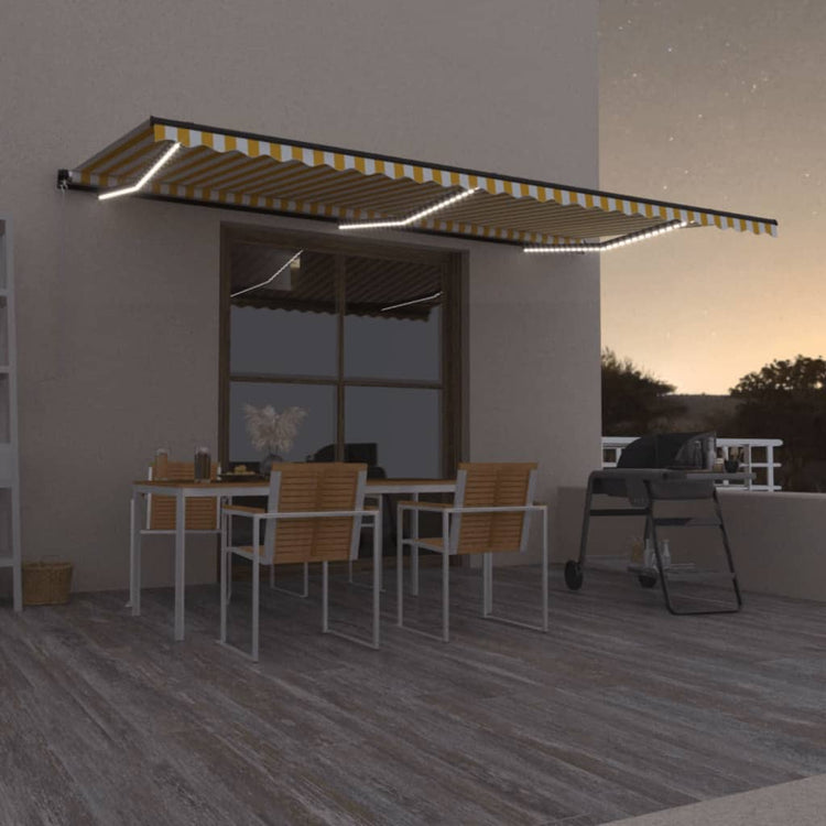 Vidaxl Luifel manuell ausziehbar mit LED 600x350 cm gelb und weiß