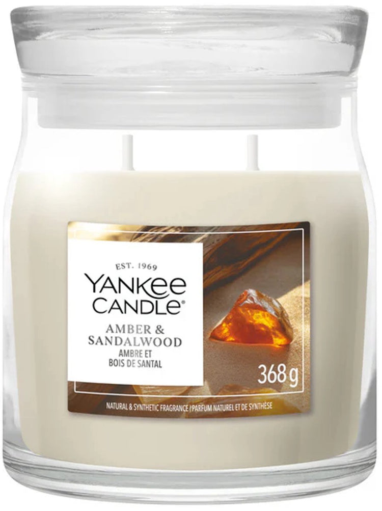 Yankee Candle – mittelgroße Duftkerze aus Bernstein-Sandelholz – 50 Brennstunden – 2 Dochte