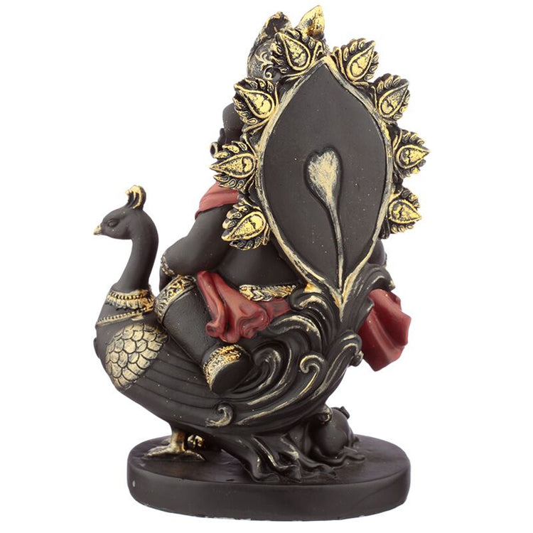 Ganesh -Statue mit Rohr und Pfau