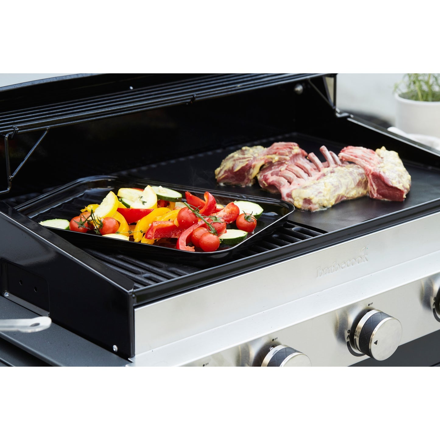 Grillen Sie eine wiederverwendbare Grillpfanne von E -Mail