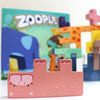 Europäisches Spielernetzwerk Zoople Brettspiel (englisch, 2 – 4 Spieler, 10 – 30 Minuten, ab 8 Jahren)